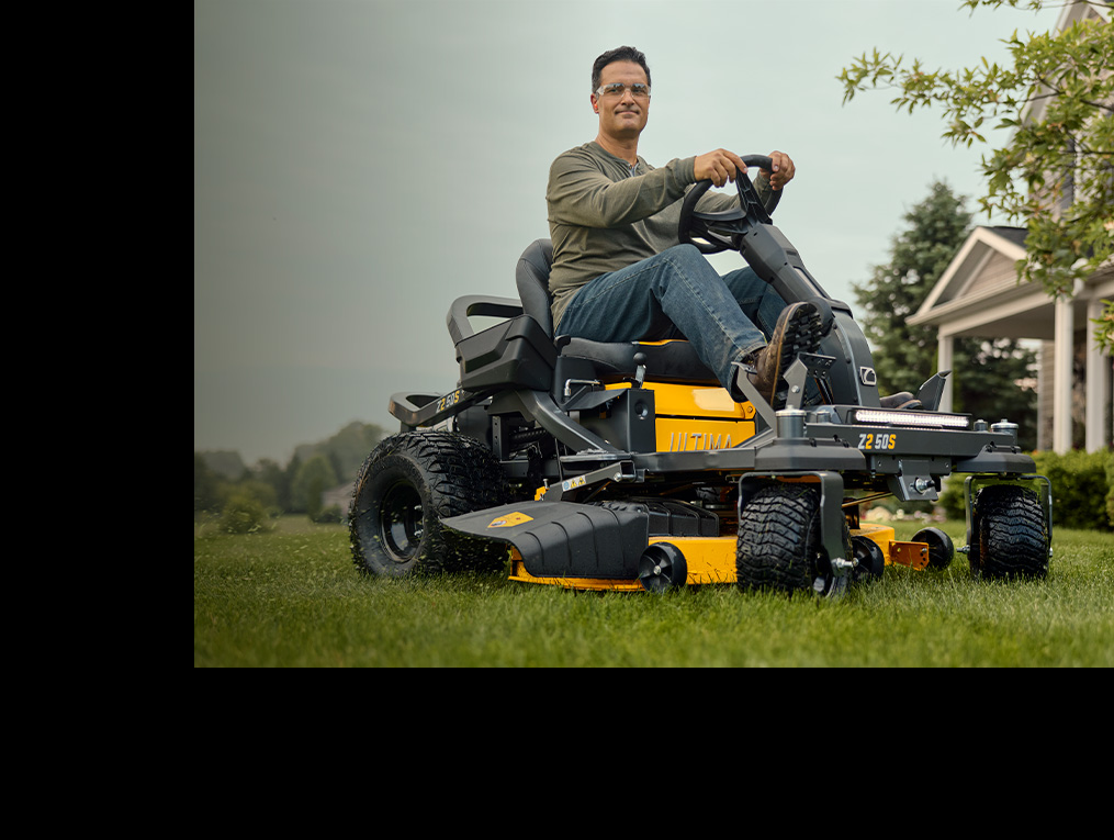 man on lawn mower