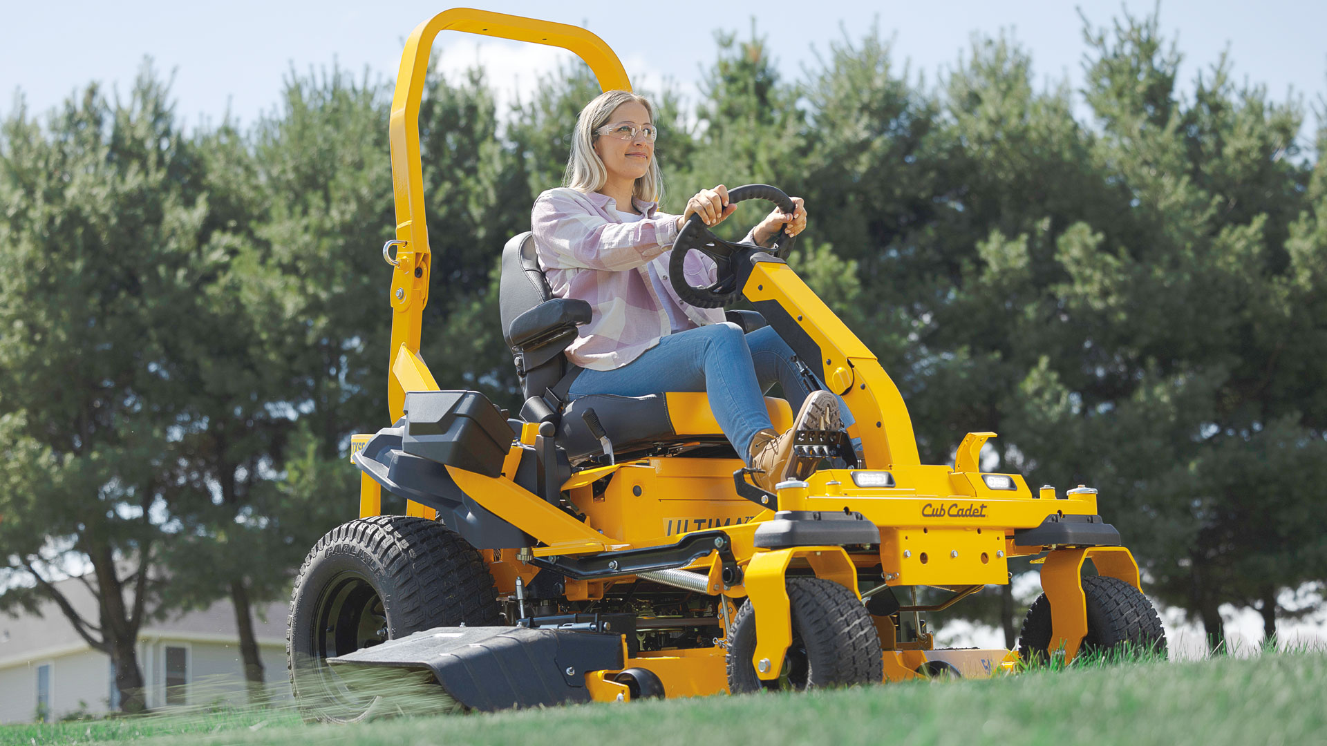 woman-riding-ztxs5-zero-turn