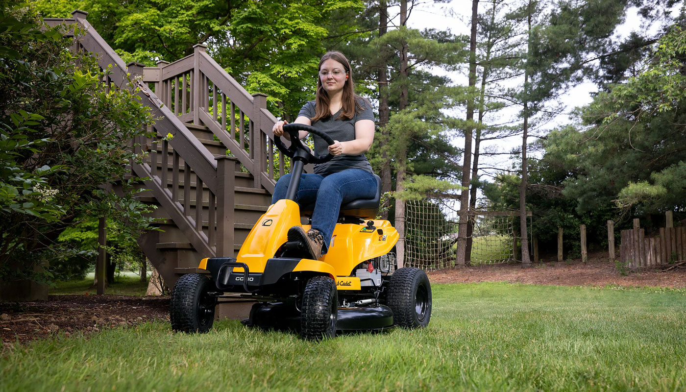 woman-operating-cub-cadet-cc30-riding-mower