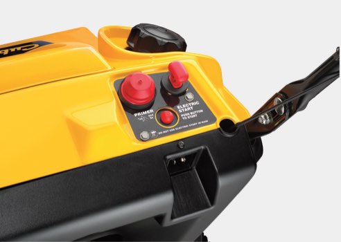 close up of a push button electric start on cub cadet snow blower