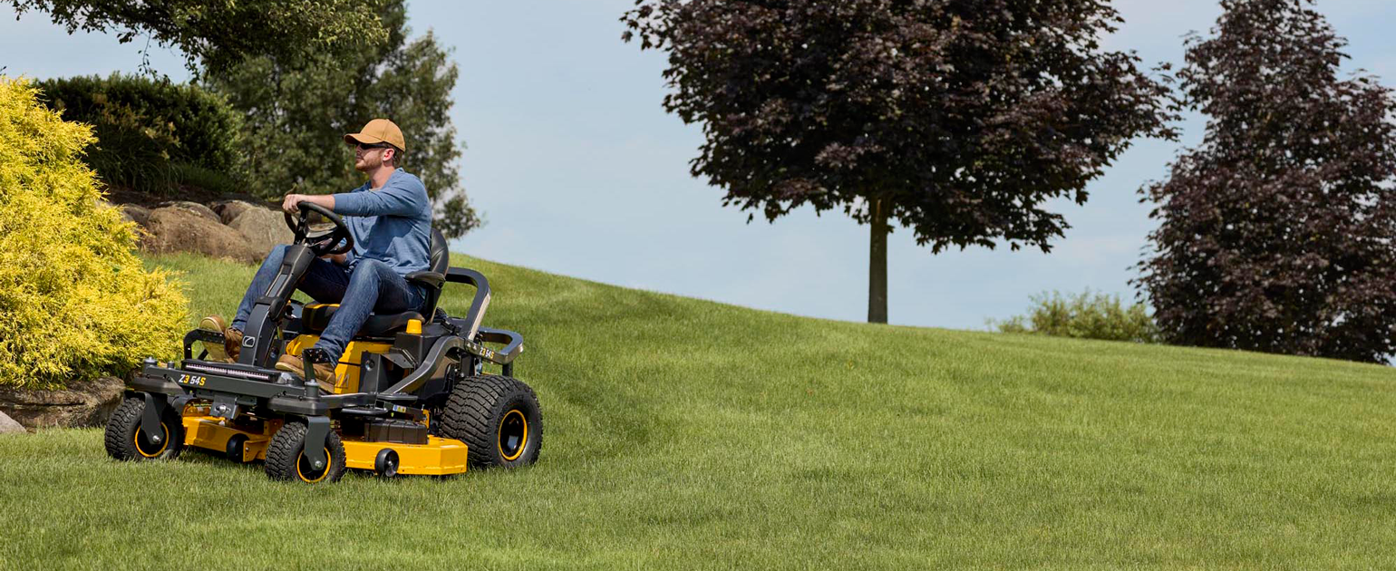man using snow blower