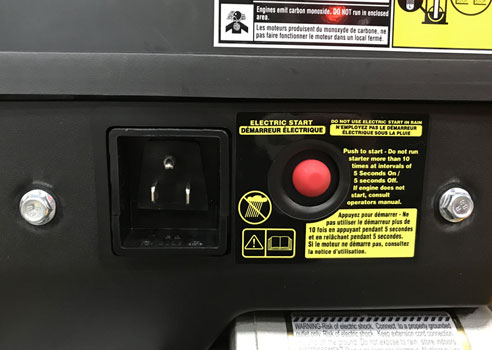 close up of a push button electric start on cub cadet snow blower