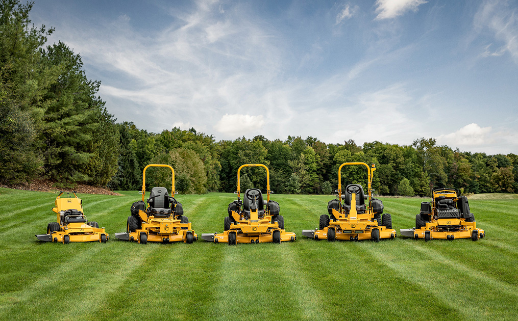 landscaper cutting grass with SurePath autonomous zero turn